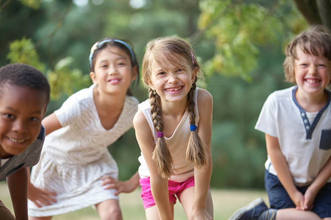 Smiling children outdoors